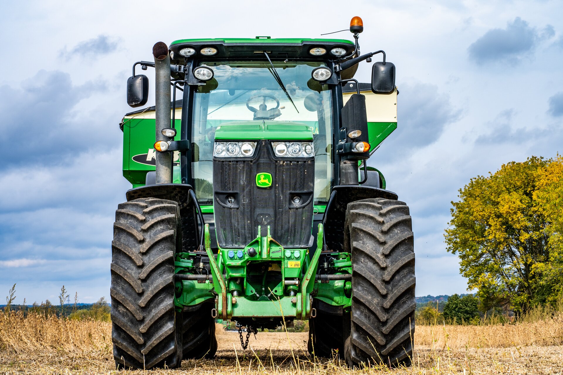 john deere tractor in a field
