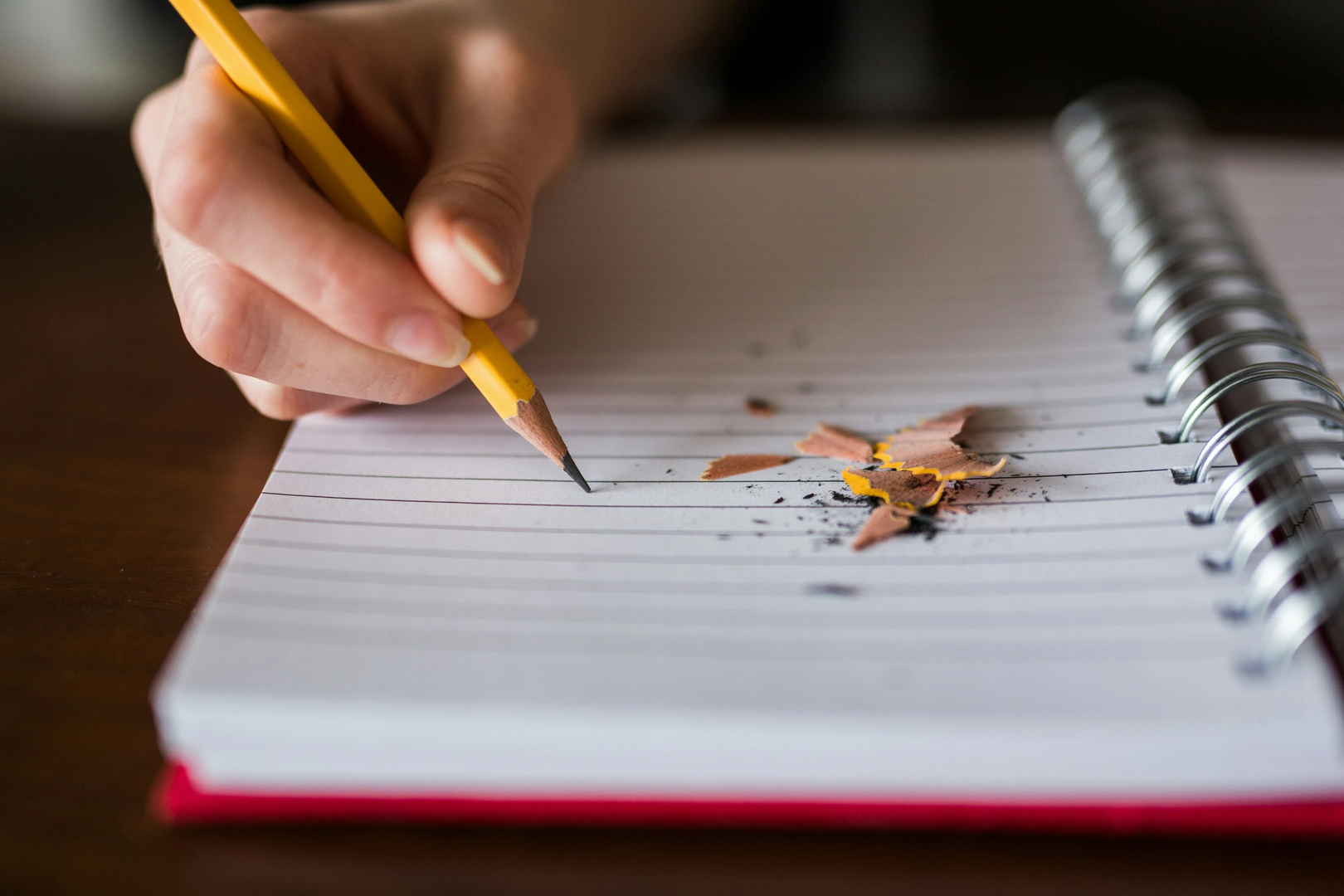 Taking notes with a pencil | © Unsplash / Thought Catalog