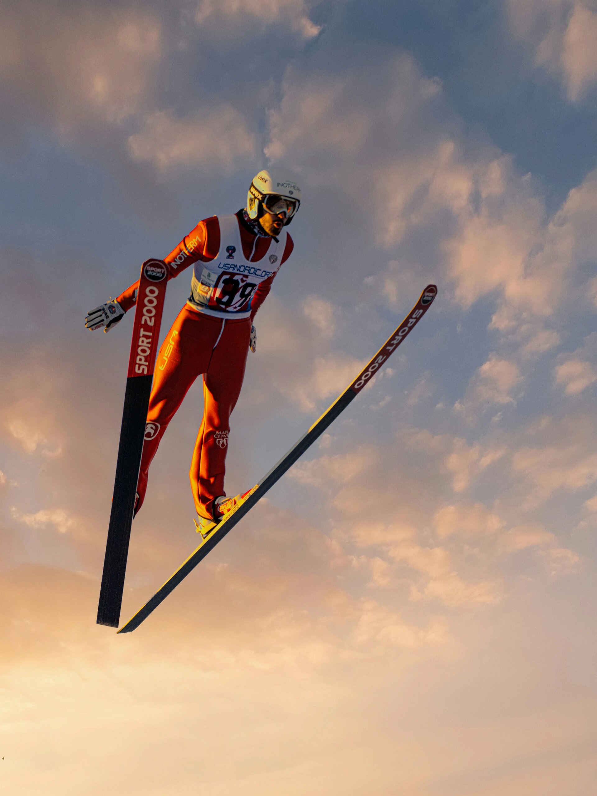 Got to photograph at the international ski jumping event. Tried to shoot something that captured the feeling of flying these guys must experience. Ended up having to lay down on my back in the snow about 5 feet from the launch ramp to get this.  (Feel free to insert 'I believe I can fly' music here)