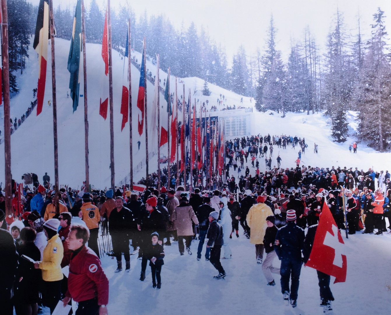 The finish of the female downhill competition at the Ski World Championship held in Val Gardena Garden Südtirol Italy. 
It's February 11, 1970. This and other images were on public display to commemorate the 50th anniversary of this event. | © Unsplash / Arno Senoner
