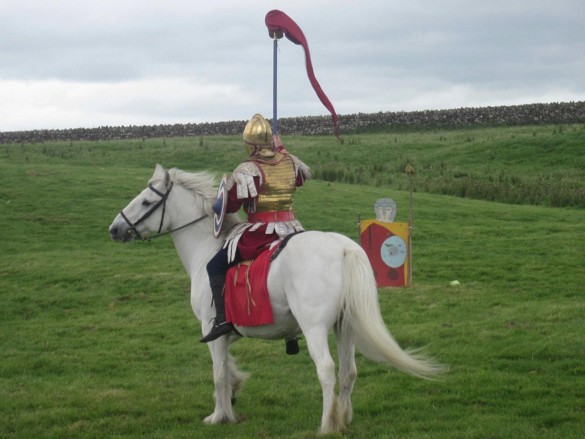 Re-enactment of Roman cavalry at Maryport, Cumbria. We happened upon this event by chance when we were visiting the Senhouse Roman museum in North west Cumbria, whilst on holiday in the Lake District. The museum is amazing full of items from the Roman fort nearby. Strange how you can capture a moment in time in a photograph on the site of the fort, which now I don't remember in detail, but I do recall a fascinating day.I absolutely love white horses too!