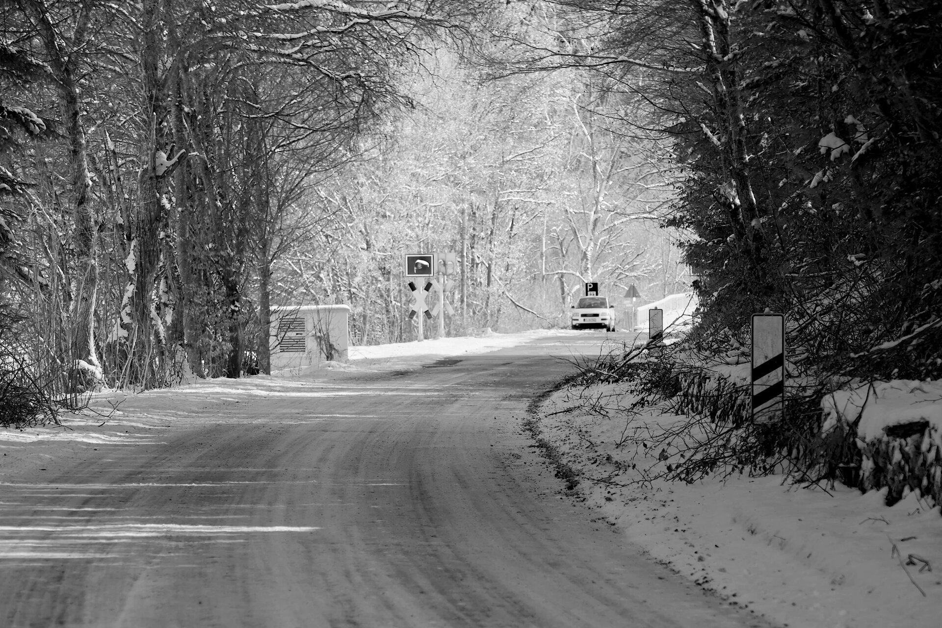 A snow-covered street in a black and white look.