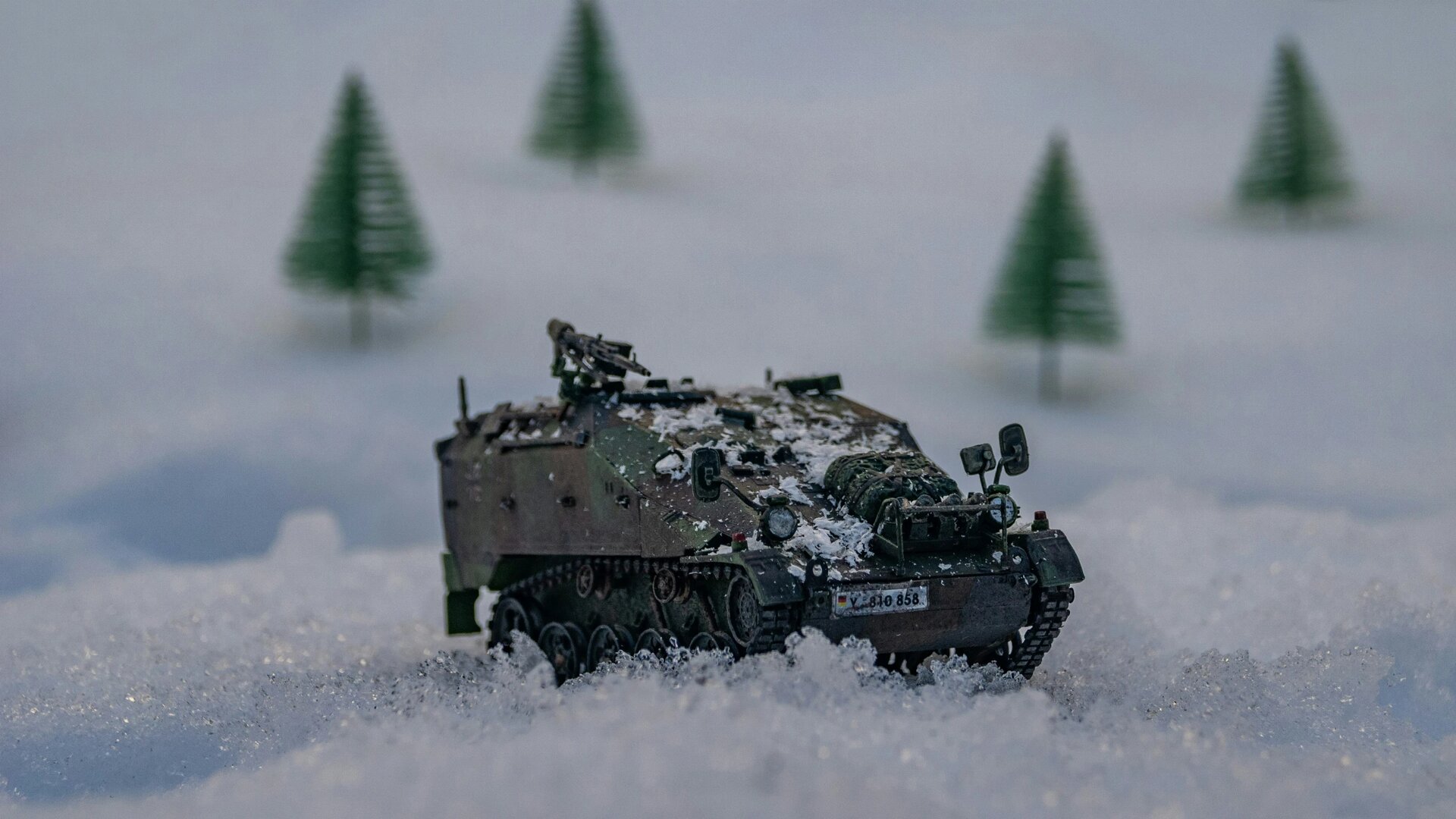 My miniature model of the German infantry support tank "Wiesel" outside in the snow.