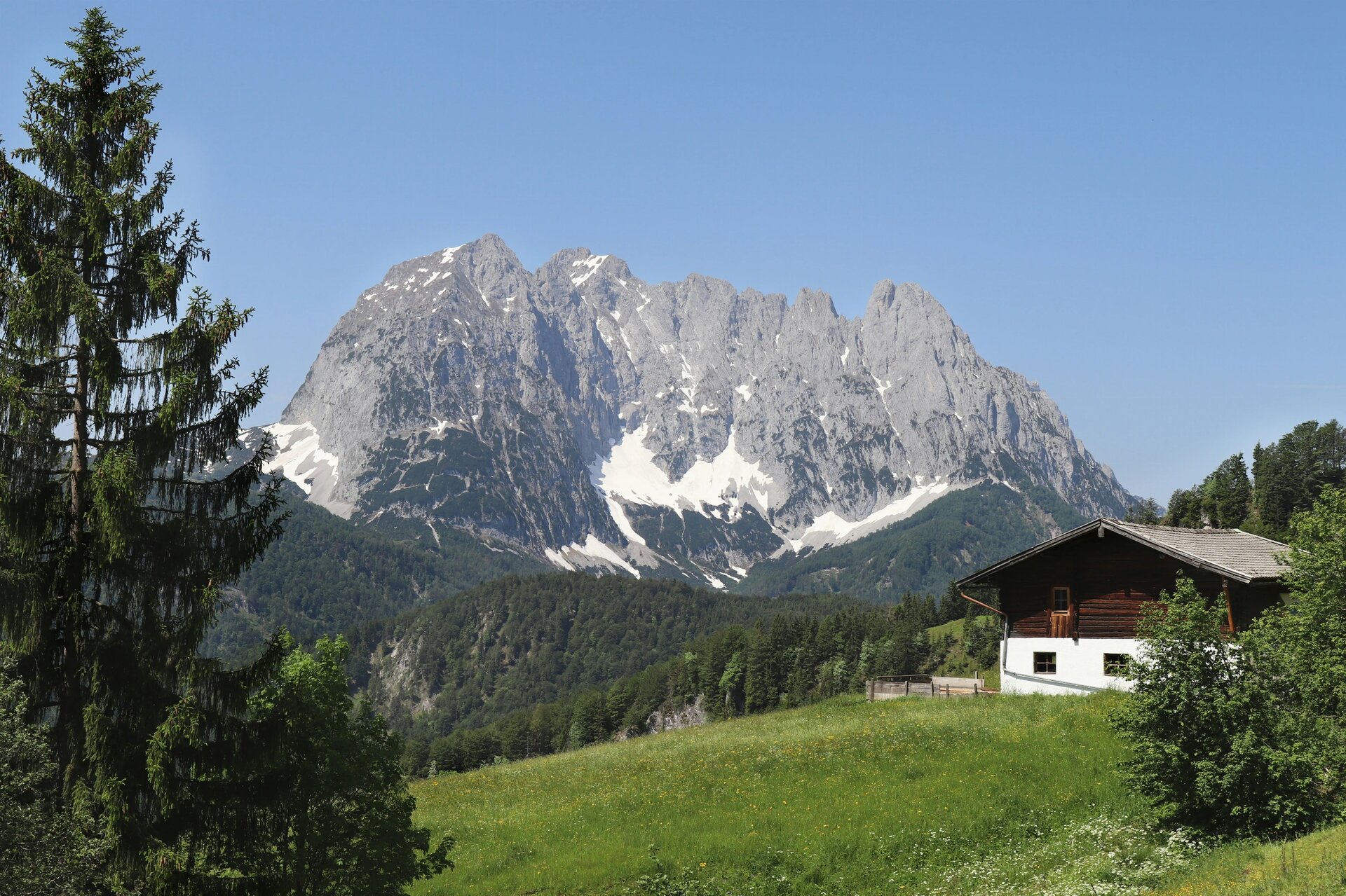 We went hiking in the Alps on a really sunny day. These old traditional huts (Almhütte) combined with beautiful mountains in the background were just perfect for taking pictures. 
